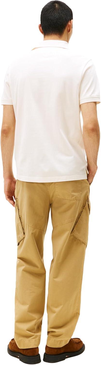 imageTommy Hilfiger Mens Short Sleeve Casual Polo Shirts in Regular Fit with Hidden Placket DesignIvory Petal