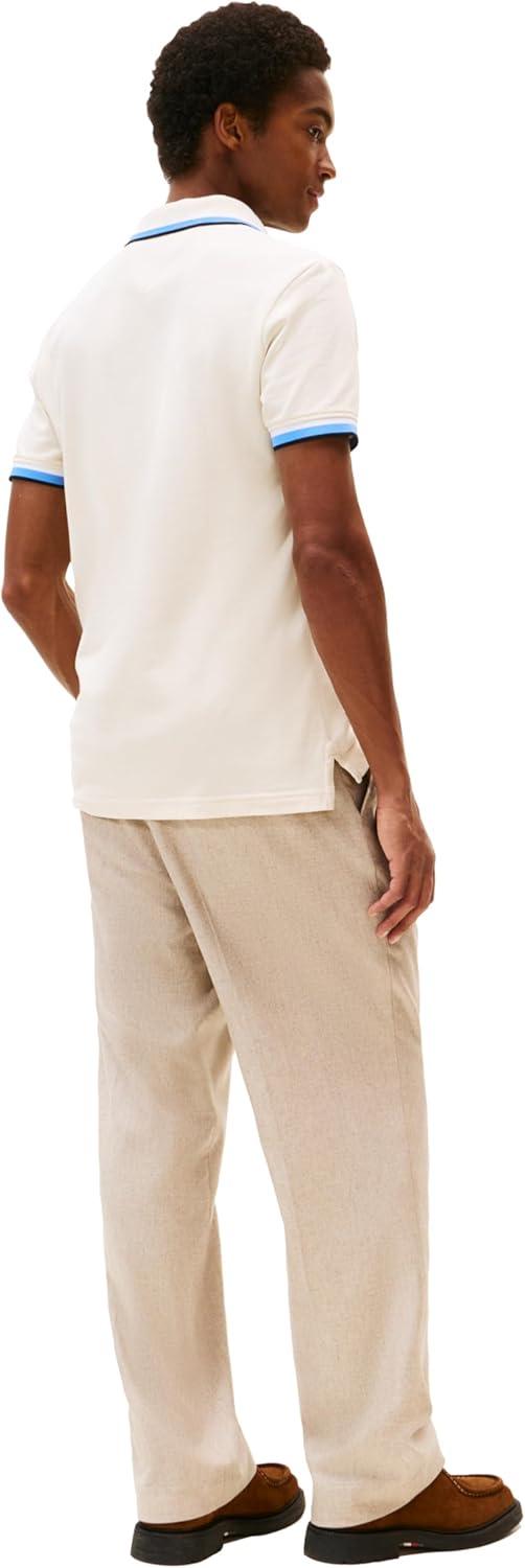 imageTommy Hilfiger Mens Short Sleeve Casual Polo Shirts in Slim Fit with Stretch and Cuff DesignsIvory Petal