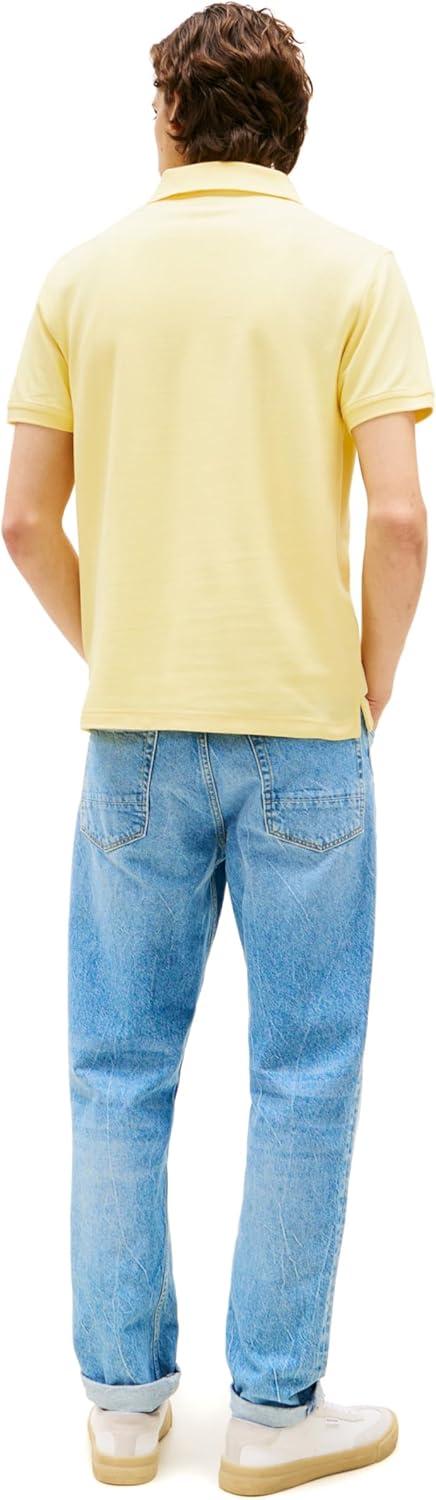 imageTommy Hilfiger Mens Short Sleeve Moisture Wicking Stretch Polo Shirt with Quick Dry UV ProtectionCitronella