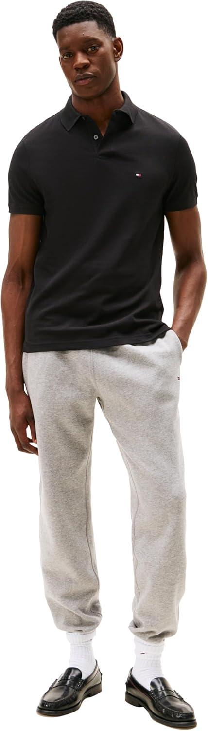 imageTommy Hilfiger Mens Short Sleeve Polo Shirts in Regular Fit with Stretch and Organic Pique CottonBlack