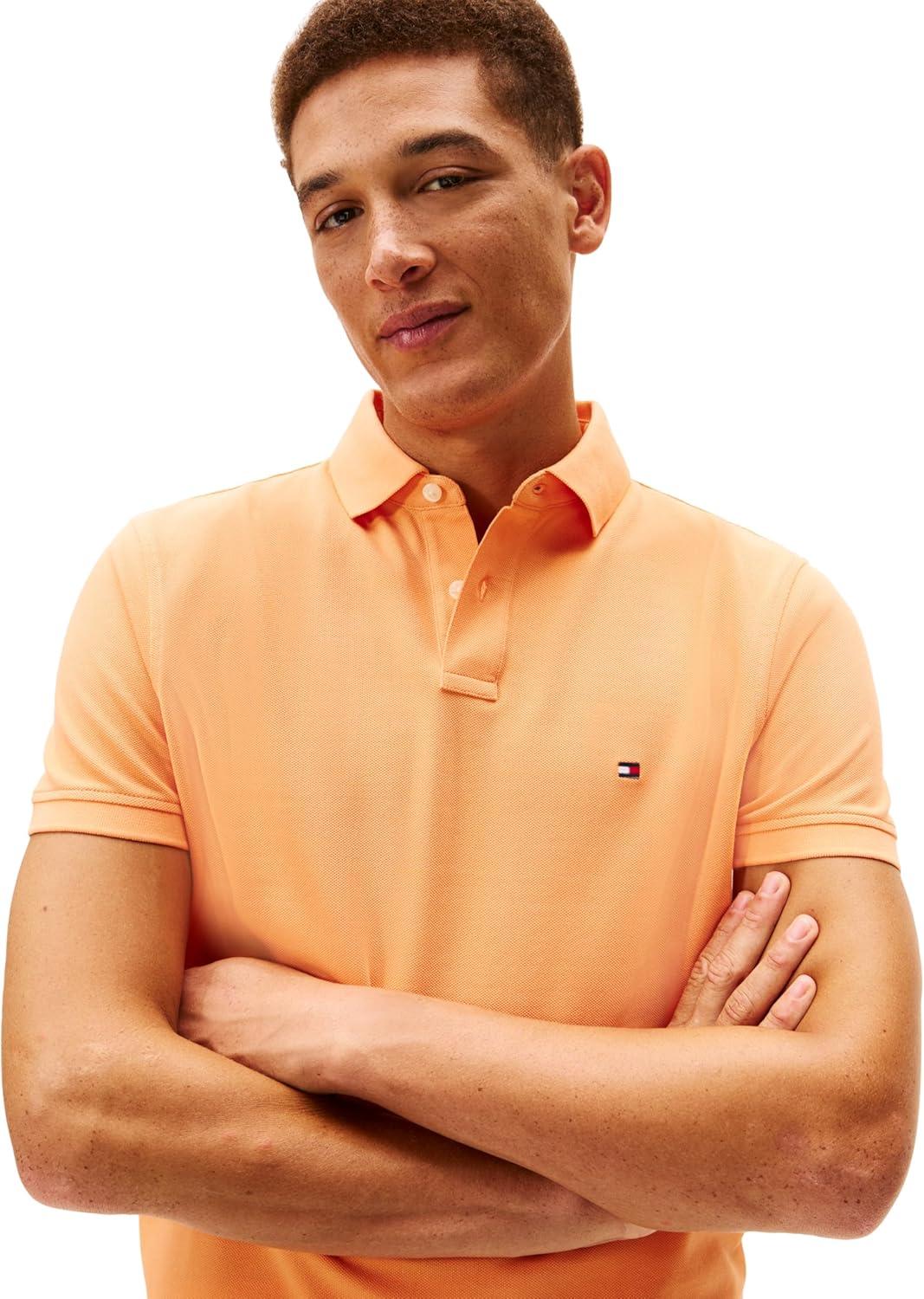 imageTommy Hilfiger Mens Short Sleeve Polo Shirts in Regular Fit with Stretch and Organic Pique CottonFruity Orange