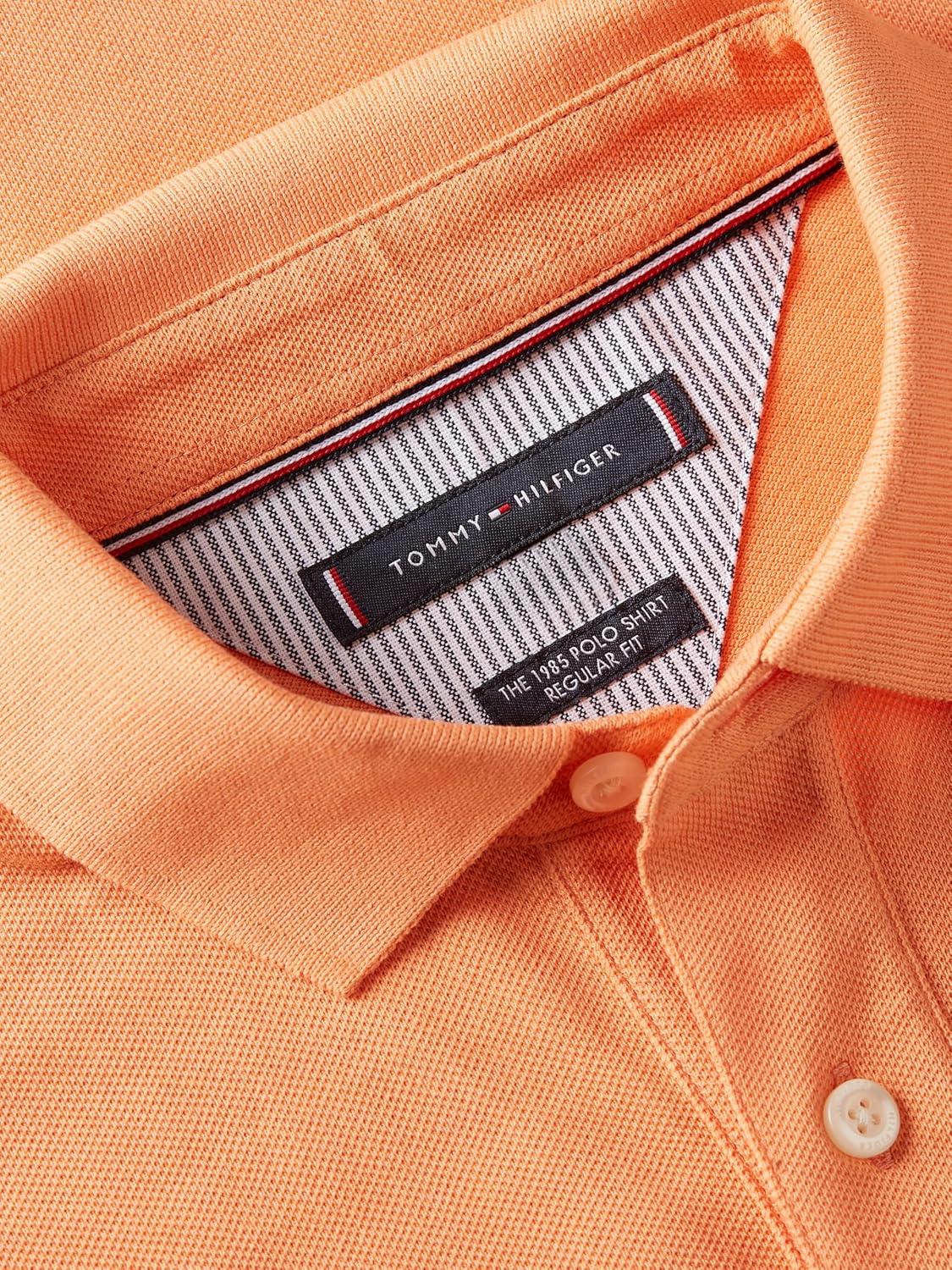 imageTommy Hilfiger Mens Short Sleeve Polo Shirts in Regular Fit with Stretch and Organic Pique CottonFruity Orange