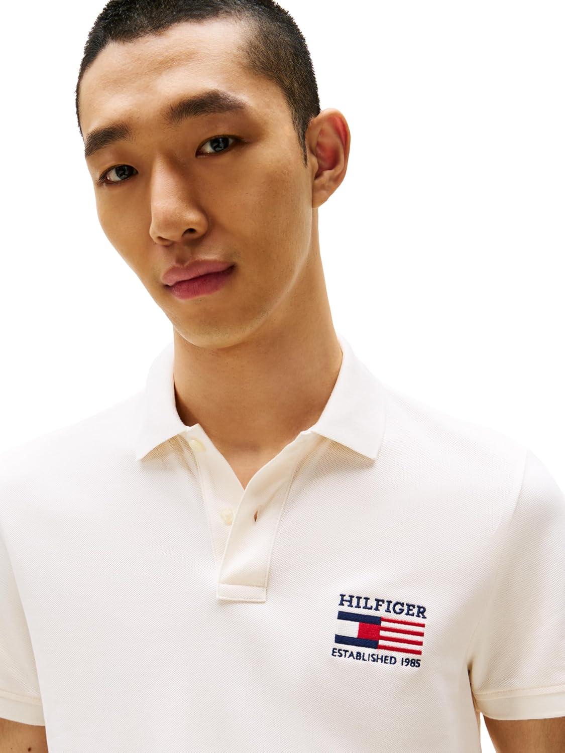 imageTommy Hilfiger Mens Short Sleeve Polo Shirts in Regular Fit with Stretch and Organic Pique CottonIvory Petal Flag Embroidered