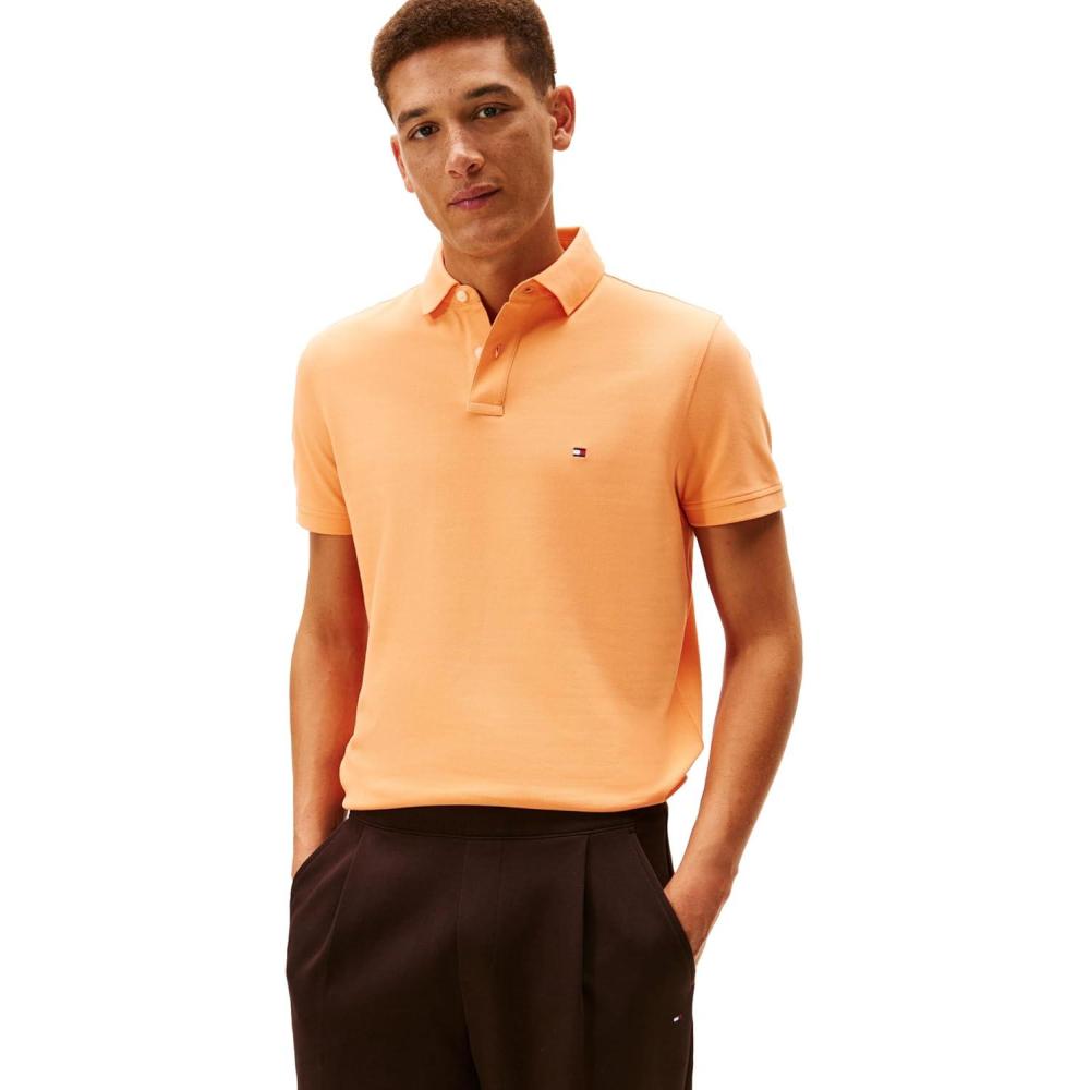 imageTommy Hilfiger Mens Short Sleeve Polo Shirts in Regular Fit with Stretch and Organic Pique CottonFruity Orange