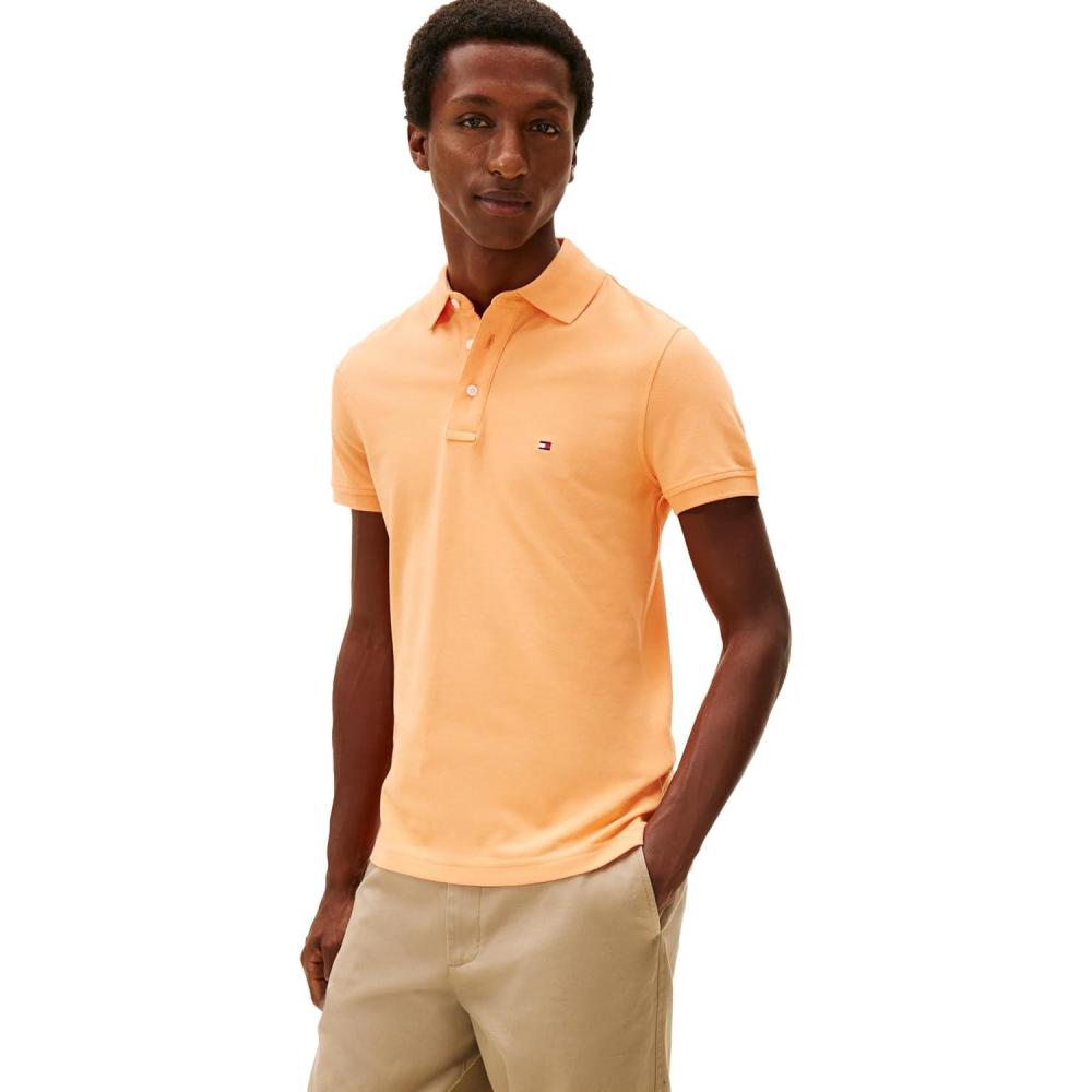 imageTommy Hilfiger Mens Short Sleeve Polo Shirts in Slim Fit with Stretch and Organic Pique CottonFruity Orange