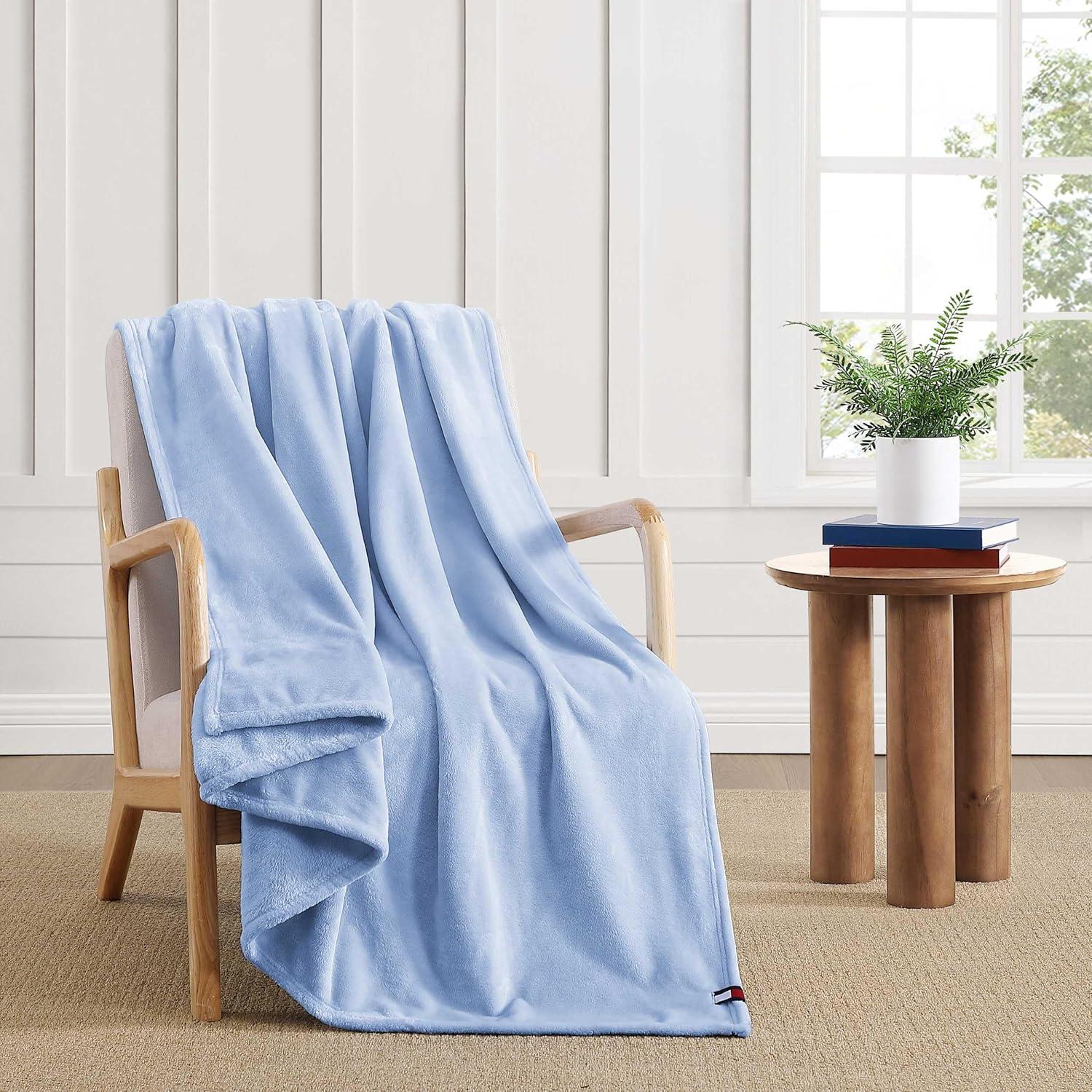 imageTommy Hilfiger Twin Plush Blanket Medium Weight Bedding for YearRound Use Perfect for Layering on Beds or Couches Dorm Essentials Light BeigeLight Blue