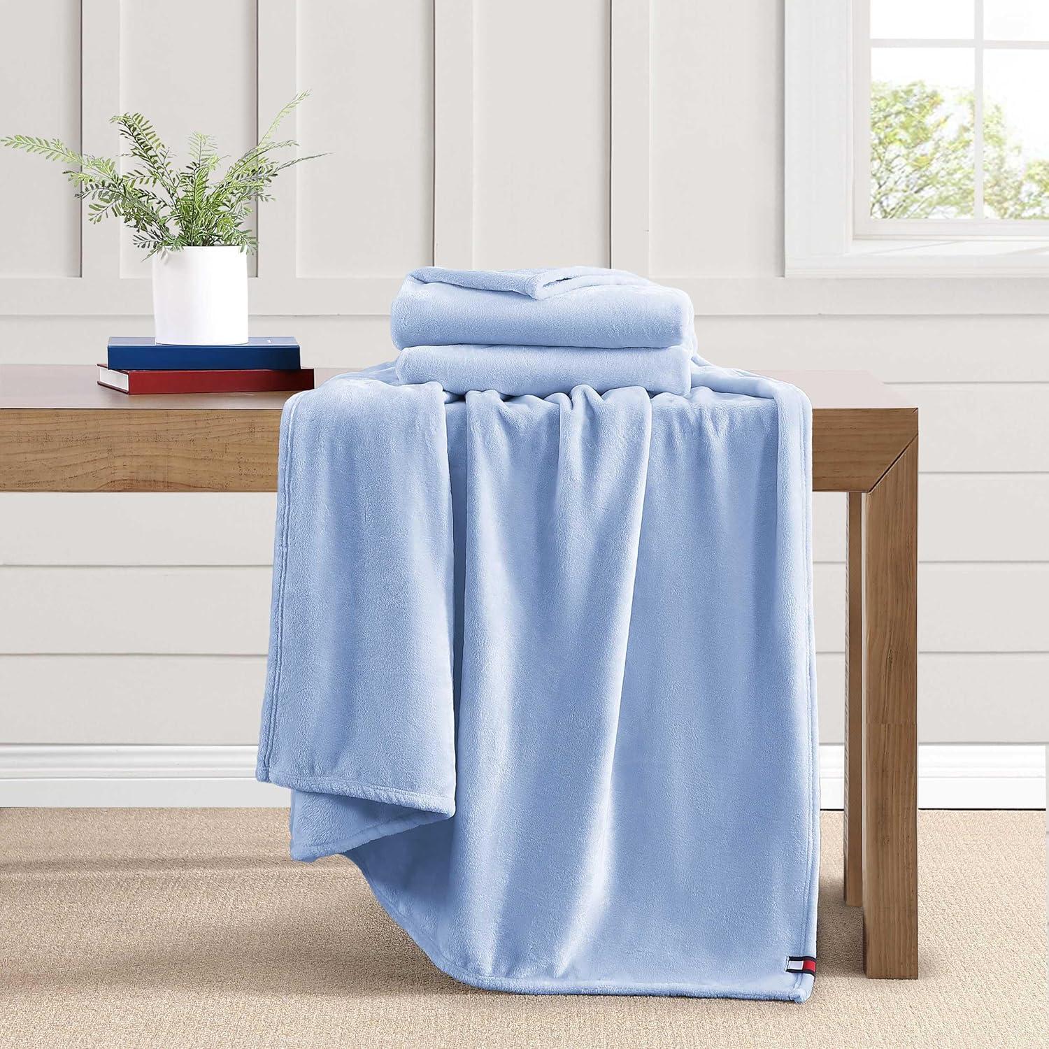 imageTommy Hilfiger Twin Plush Blanket Medium Weight Bedding for YearRound Use Perfect for Layering on Beds or Couches Dorm Essentials Light BeigeLight Blue