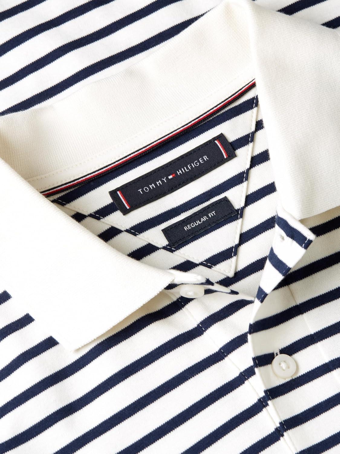 imageTommy Hilfiger Mens Short Sleeve Casual Polo Shirts in Regular Fit with Liquid CottonIvory Petal Carbon Navy