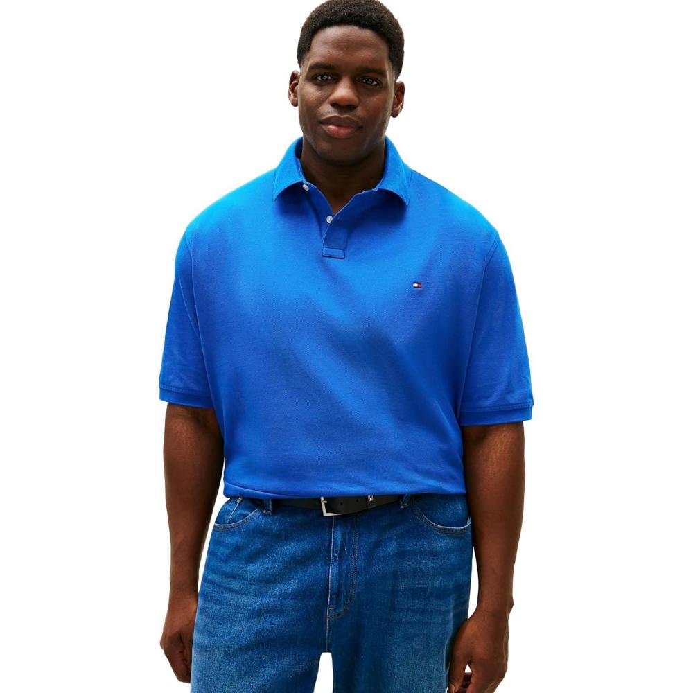 imageTommy Hilfiger Mens Short Sleeve Polo Shirts in Regular Fit with Stretch and Organic Pique CottonVibrant Indigo