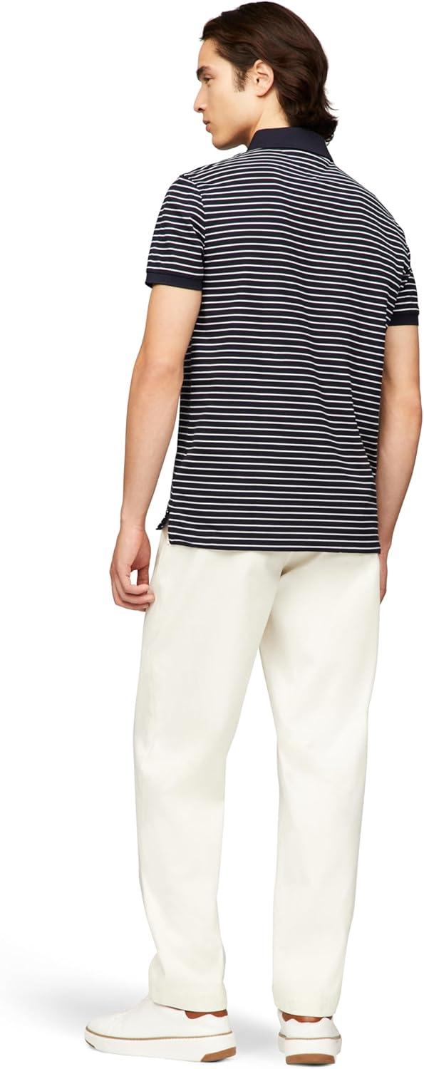 imageTommy Hilfiger Mens Short Sleeve Casual Dri Fit Polo Shirts in Regular Fit with Moisture Wicking and StretchDesert Sky White