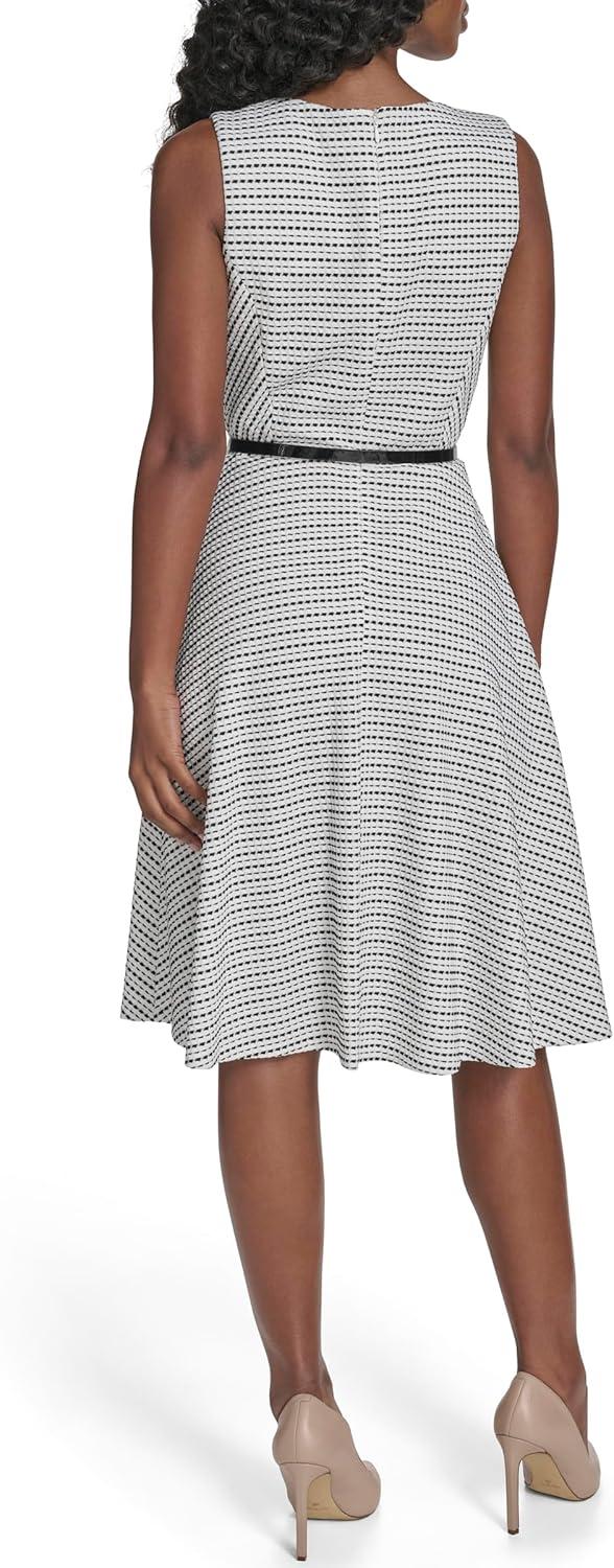 imageTommy Hilfiger Womens Sleeveless Crew Neck Pinwheel Knit Belted Fit and Flare DressIvoryBlack