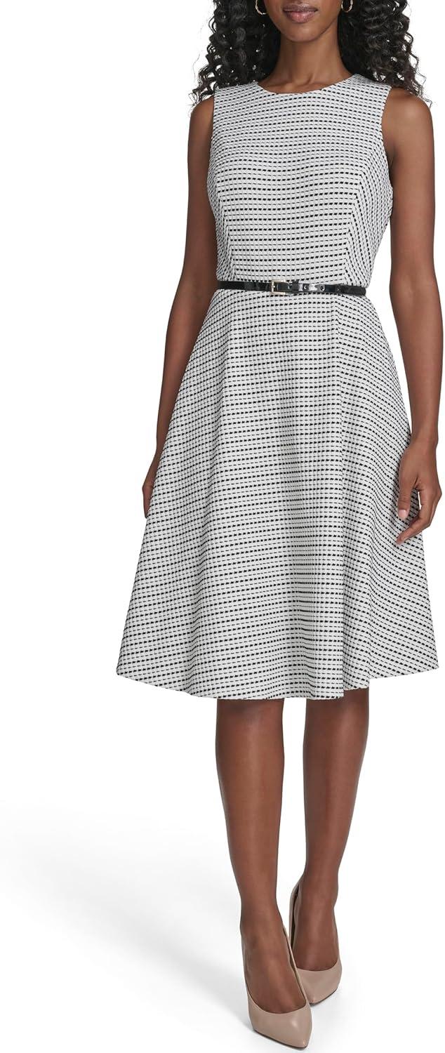 imageTommy Hilfiger Womens Sleeveless Crew Neck Pinwheel Knit Belted Fit and Flare DressIvoryBlack
