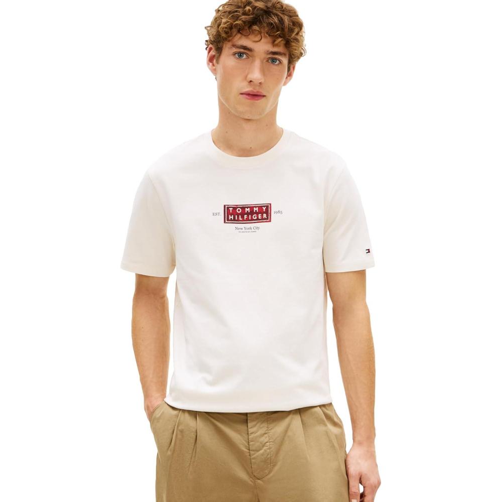 imageTommy Hilfiger Mens Short Sleeve Cotton Graphic TShirts with Printed Heritage Label DesignIvory Petal