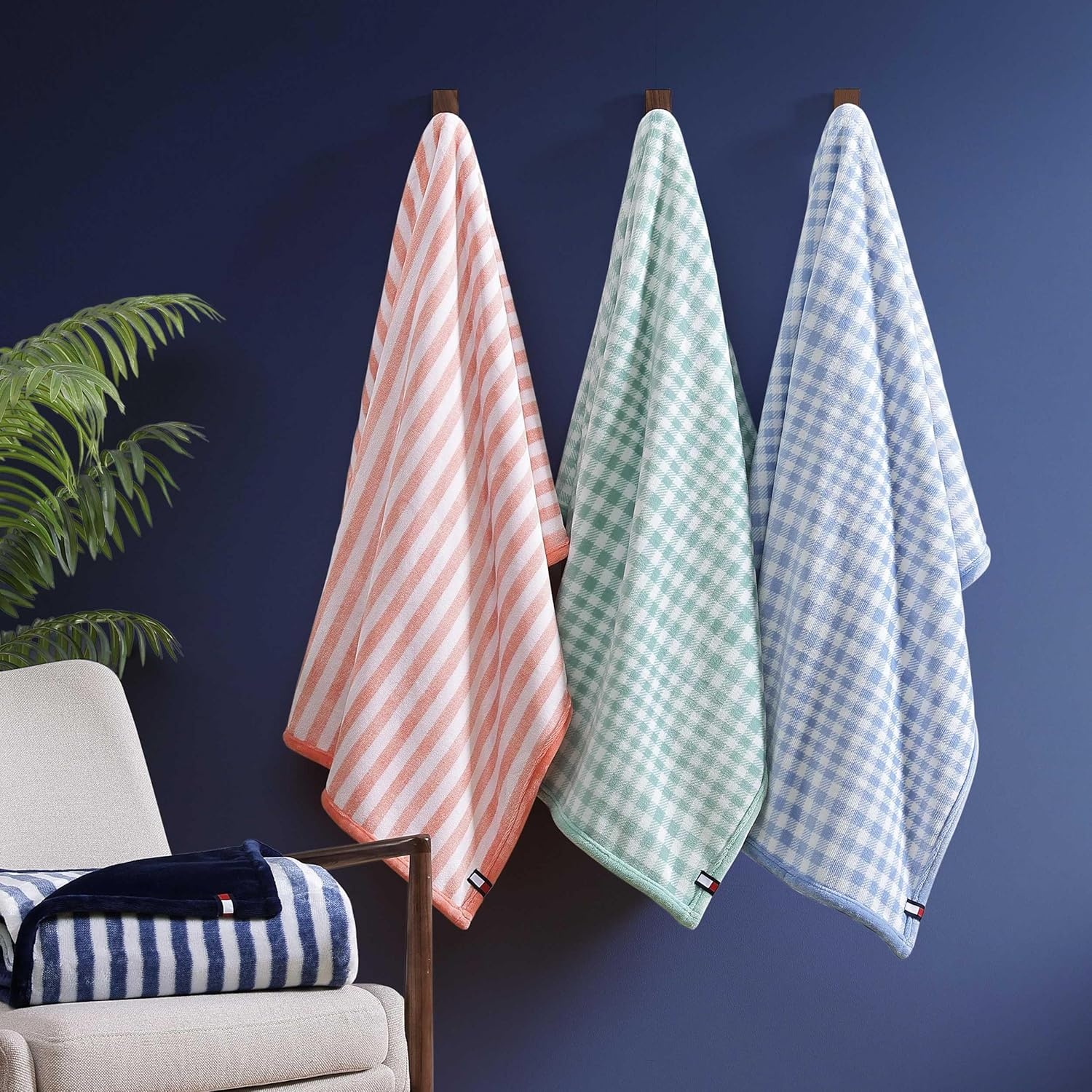 image:imageTommy Hilfiger Throw Blanket Plush Bedding with a FleeceKnit Texture Soft Throw Blanket for Couch or Bed Modern Check Solid Blue 50 x 70Laguna Beach StripeSolid Pink