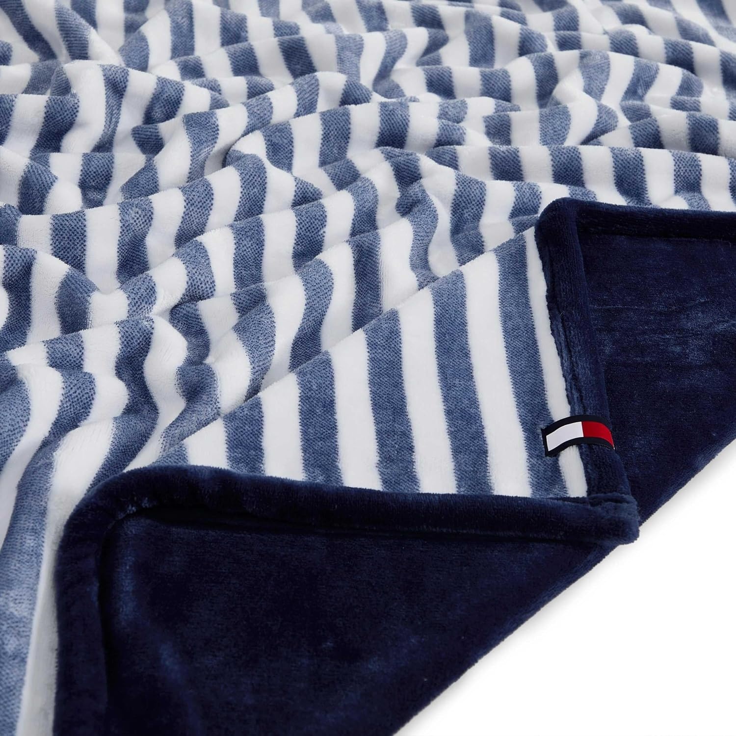 image:imageTommy Hilfiger Throw Blanket Plush Bedding with a FleeceKnit Texture Soft Throw Blanket for Couch or Bed Modern Check Solid Blue 50 x 70Laguna Beach StripeSolid Blue