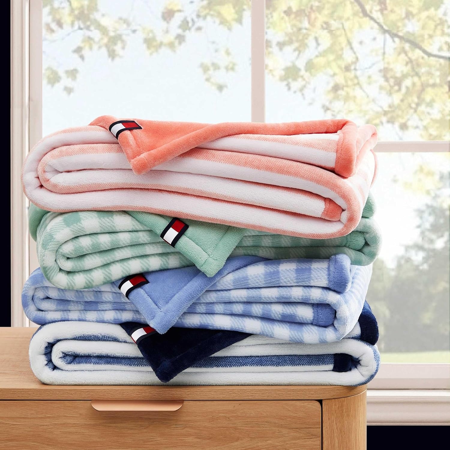image:imageTommy Hilfiger Throw Blanket Plush Bedding with a FleeceKnit Texture Soft Throw Blanket for Couch or Bed Modern Check Solid Blue 50 x 70Laguna Beach StripeSolid Pink